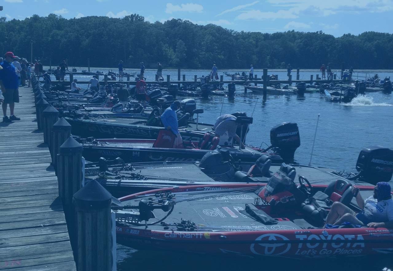 Bass boats at the dock at the BASS Masters tournament in Smallwood, Maryland