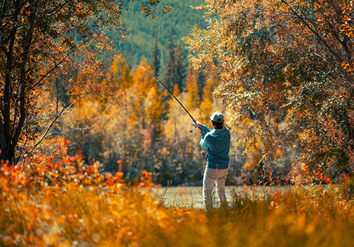 Fishing amid Autumn foliage