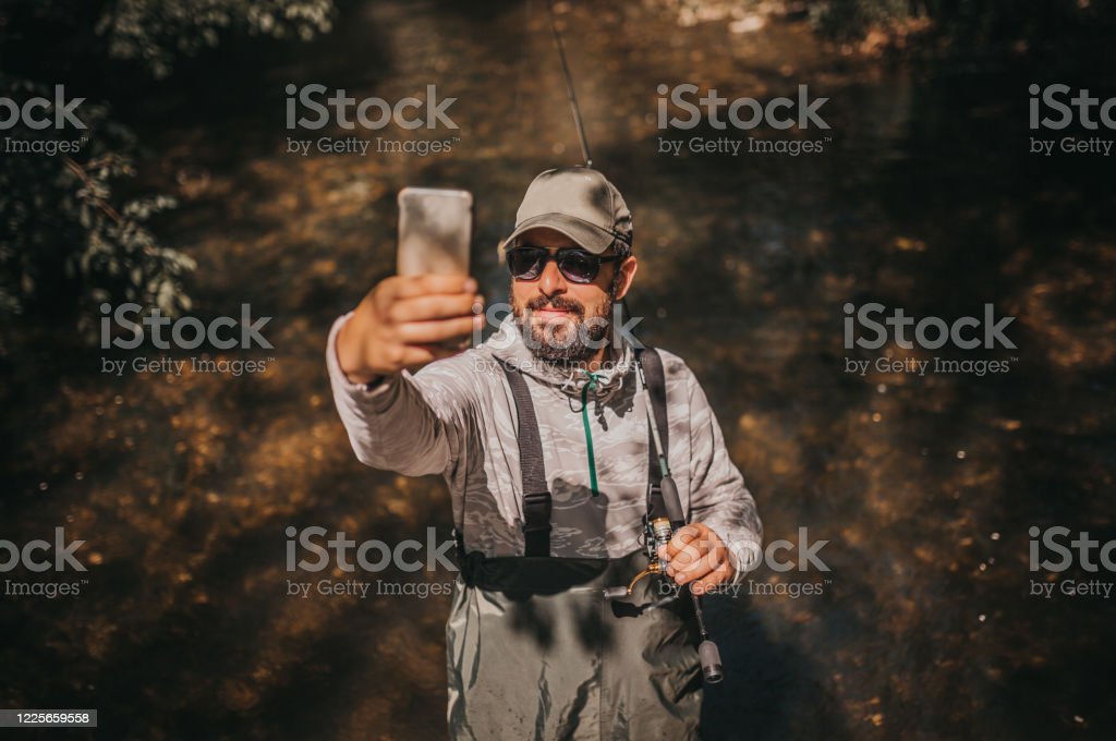 Fisherman making a selfie