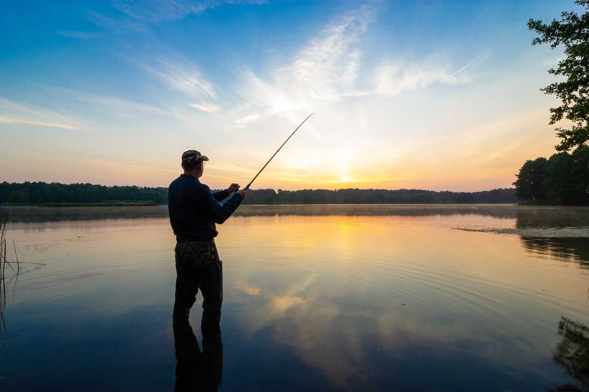 Fisherman standing in the water