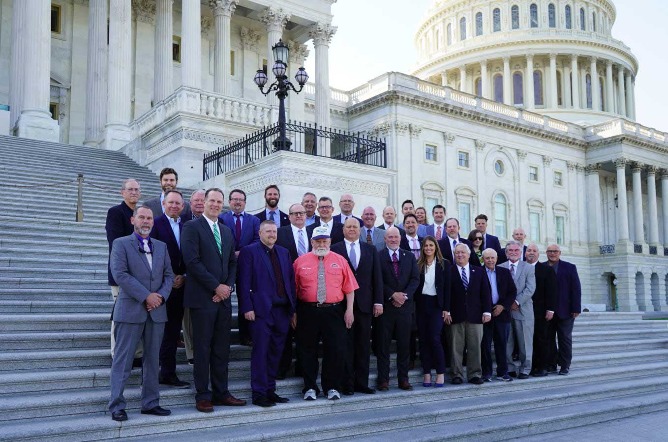 Group of American Sportfishing Association representatives in front of the U.S. Capitol. 