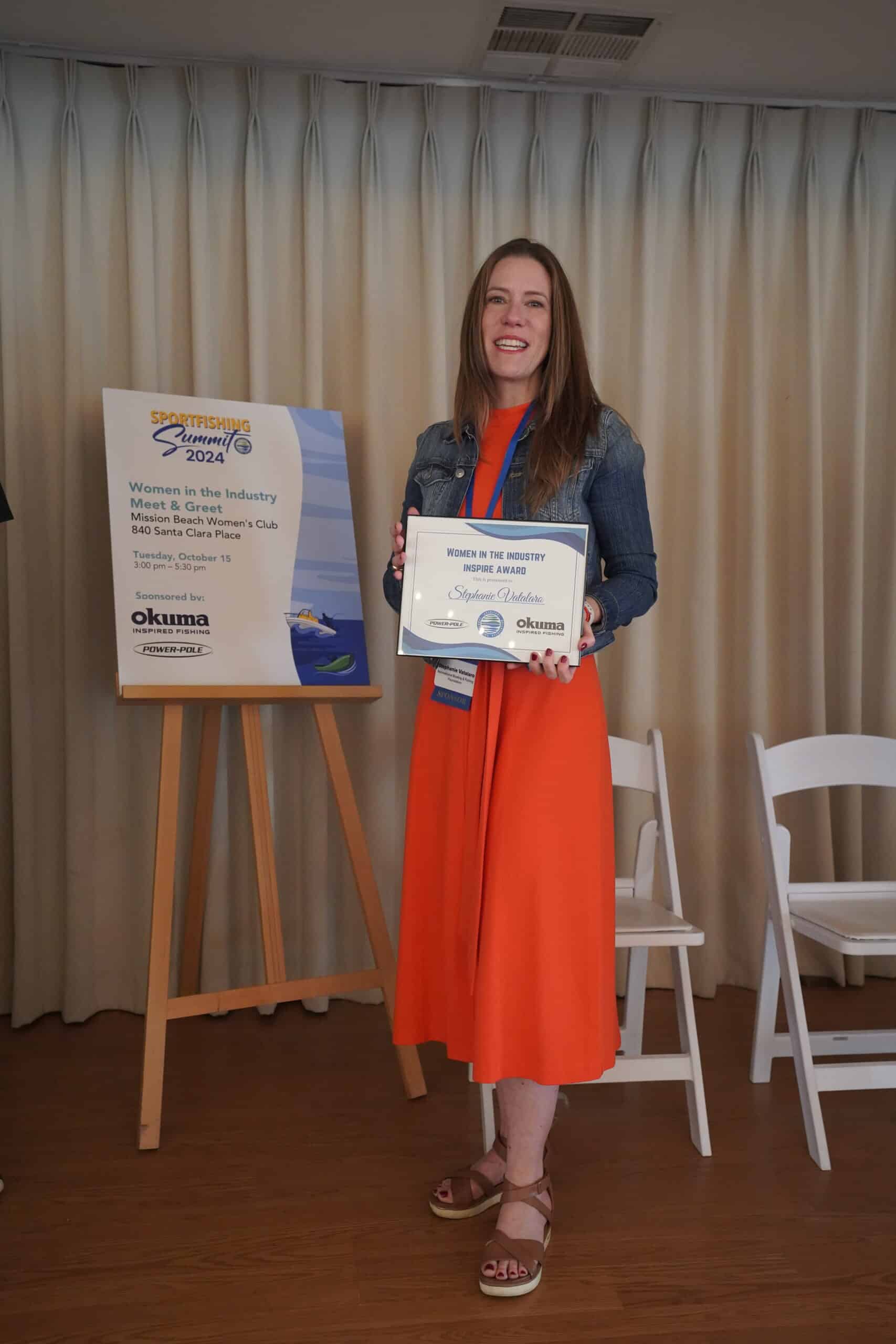 Woman receiving award