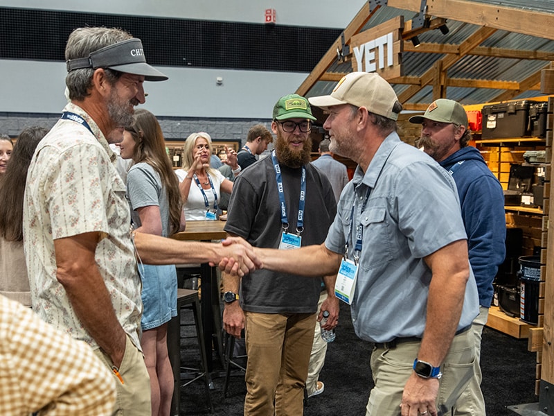 iCast2026_05_Show Floor_Select-7444 networking in front of yeti booth